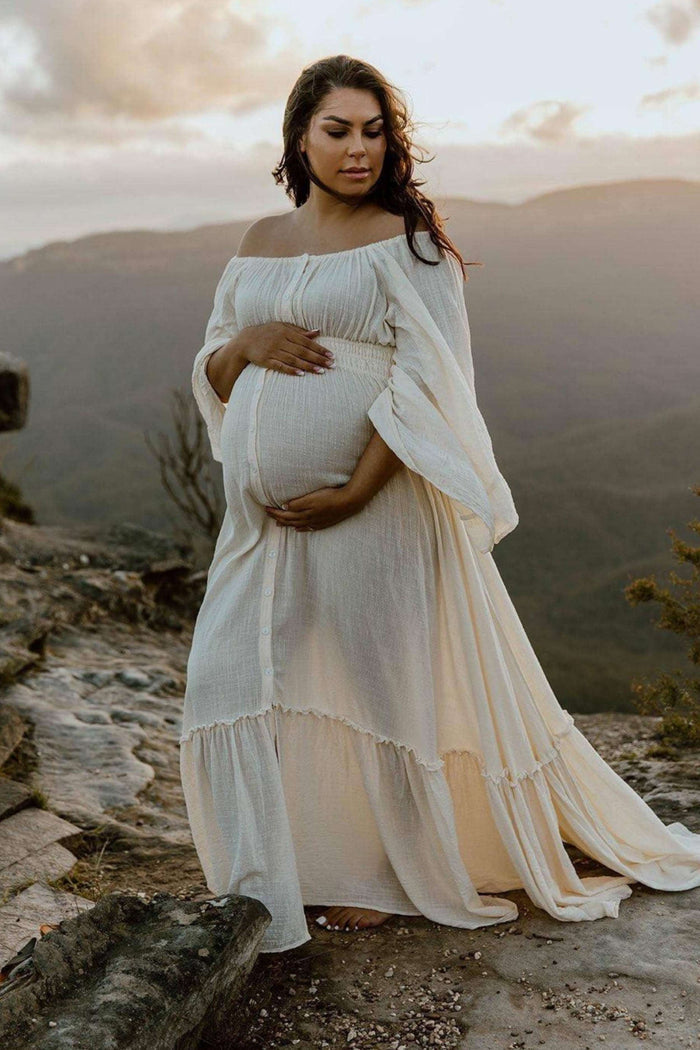 Maternity Dress Hire - We Are Reclamation Ruffle Me Open Gown Buttercream - Linen gauze gown with elasticated waist and shoulders, buttons all the way down the front for a bump-friendly look.